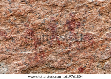 Detail of the prehistoric rock paintings of the San People in Western Namibia, near Spitzkoppe.