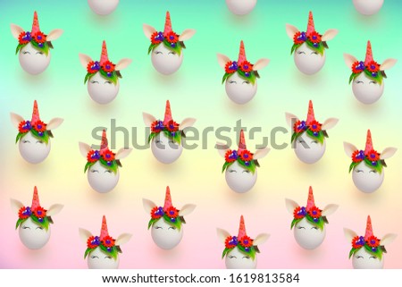cute Easter eggs unicorns pattern on a rainbow pastel background
