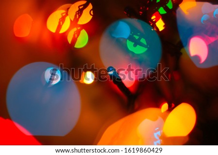 many sparks macro photo bokeh background Christmas and New Year