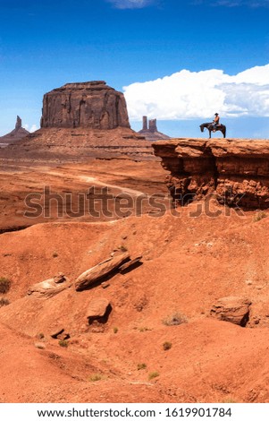 Legendary scene of a cowboy in Monument Valley (USA)