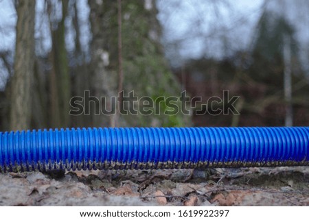 a blue pipe in nature