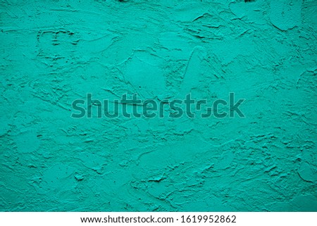 greenish-blue texture decorative Venetian stucco for backgrounds. Royalty-Free Stock Photo #1619952862