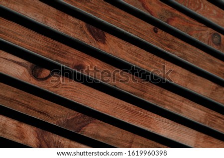 Wall of wood panels. Wooden boards. Old wooden beams.