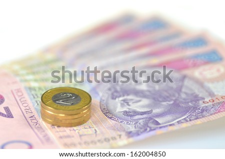 zloty banknotes and coins from poland
