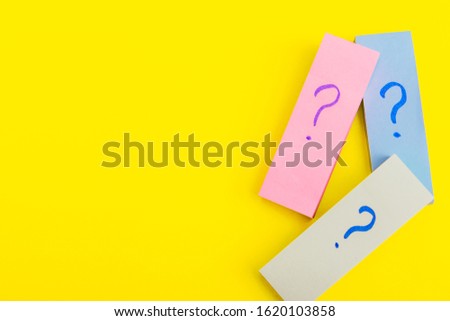 question marks posters.  written reminders tickets