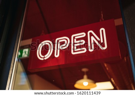 Open neon sign in a London restaurant