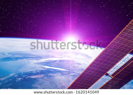 Highly detailed epic sunrise from space. The elements of this image furnished by NASA.
