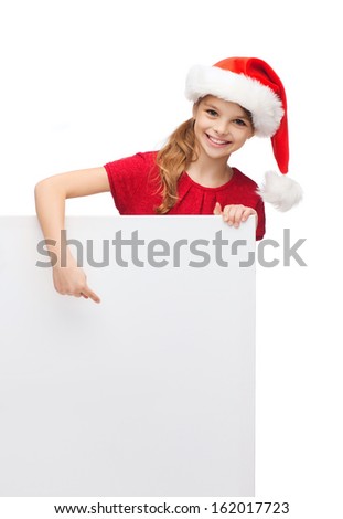christmas, x-mas, people, advertisement, sale concept - happy girl child in santa helper hat with blank white board