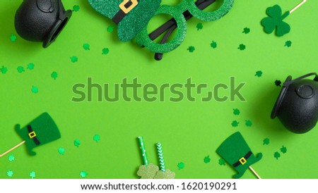 St Patrick’s day party invitation card with pots of gold, leprechaun hats, shamrock four leaf clover, Patricks day glasses on green. Saint Patricks day frame, banner mockup, greeting card template