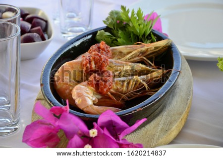 shrimp casarole on table with mezes