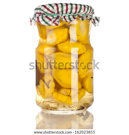 natural squash pattypan homemade canned preserved in glass jars pots isolated on white background 