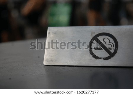No smoking warning a symbol.