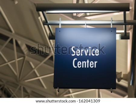 Blue Signage Marks the Customer Service Center in a Public Building Shopping Structure
