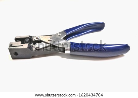 Card hole punching pliers Round shape on a white background