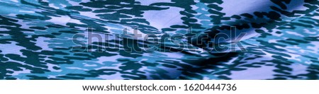 Background design texture, blue silk fabric, abstraction, copyright print, military camouflage fleece fabric, your designs will allow you to be military,