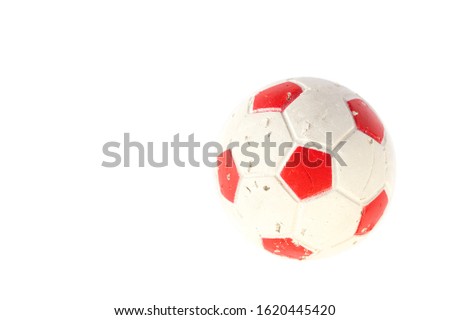 chewed rubber ball for dogs isolated on white background.