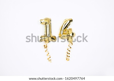  Gold foil balloons numeral 14 on white background. Happy Valentines Day