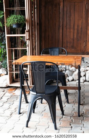 Minimal cafe exterior decorating with simply furniture set, stock photo