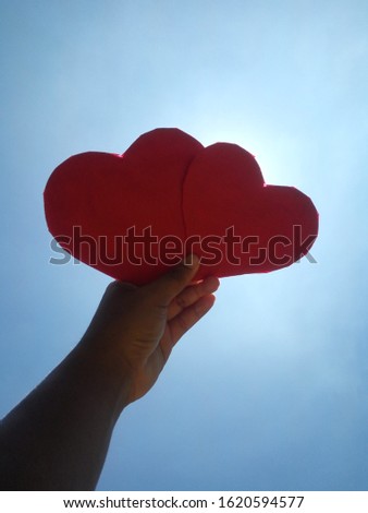 love symbol with blue sky background
