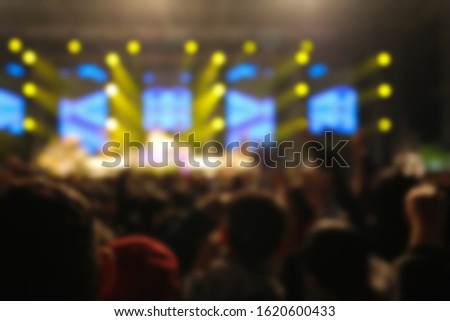 Blur background of concert lighting on stage
