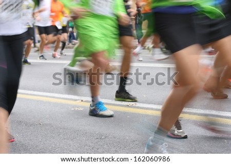 Marathon runners, blurred motion