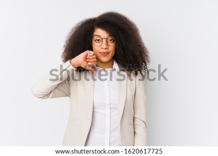 Young african american business woman showing a dislike gesture, thumbs down. Disagreement concept.
