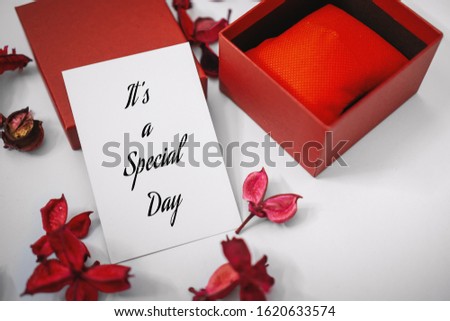 It's a Special Day. Paper Card and Gift Box with Dry Flower Petals. Love and Romance Concept.