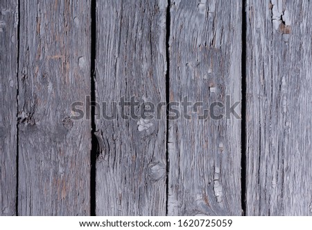 Old wooden background with peeling paint. Stock photo wood texture top view.