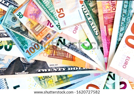 Dollar and euro sign. American and European money. Background money, usa and europe bills. Money Fal. Cash, currency.