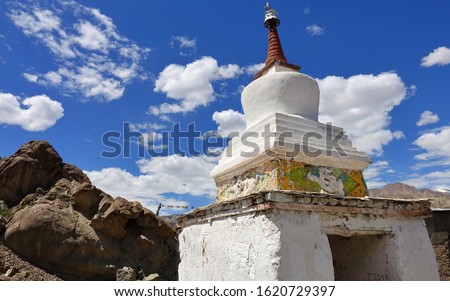 A Ladakhi stupa a mound-like or hemispherical structure containing relics (typically the remains of Buddhist monks or nuns) that is used as a place of meditation 