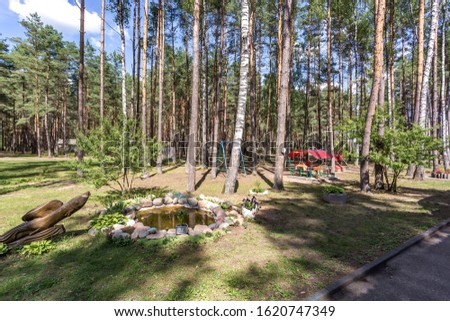 wooden camping arbors  with all conviniences in a pine forest