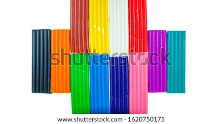 multi-colored plasticine isolated on a white background.