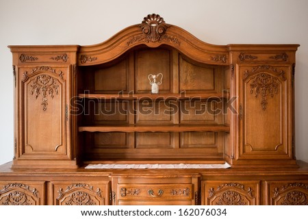 Antique furniture chest of drawers bookshelf Royalty-Free Stock Photo #162076034