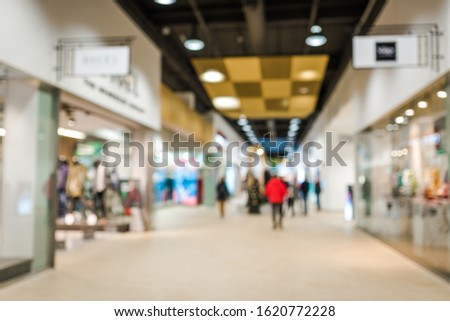 Blurred shopping mall background. Holiday shopping. 