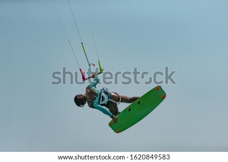 Kitesurfing on the waves of the Red sea, Egipt. Kitesurfing, Kiteboarding action photos Kitesurfer In action 