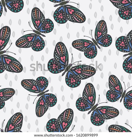 Butterfly silhouettes seamless pattern on white background. Hand drawn vector illustration in folk style for textile, party paper, wallpaper design.
