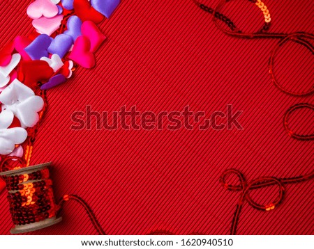 greeting card with a colorful hearts and space for text on a red background. Valentine, wedding decorations. Various hearts