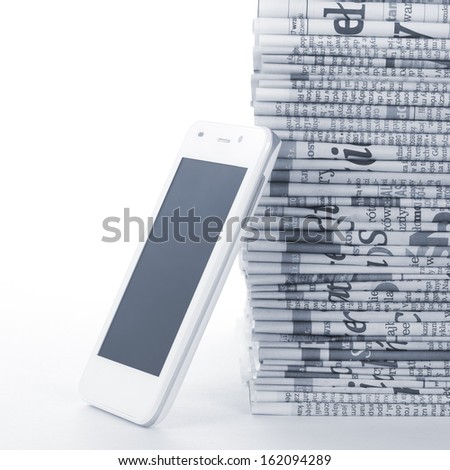 Phone and Newspapers folded and stacked concept for global communications 