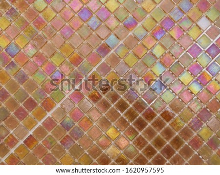 Colorful ceramic mosaic tiles decorate on a wall