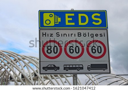 Sign "Speed limit zone" printed in white, EDS - Electronic Controlling System. Street sign in Instanbul. Turkey. Concept of controlling traffic in big city