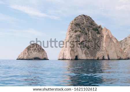 Beautiful coastline. Rocks in blue caves Greece, south of the island of Zakynthos, Keri area. Bright blue sea water of the Ionian Sea. Ecological tourism 