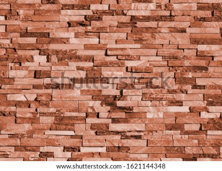 Old bronze brick wall texture background, stone block wall texture, rough and grunge surface as used for backdrop, wallpaper and graphic web design. Interior home new pattern designed structure 
