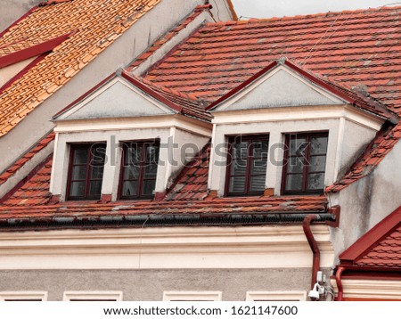 roof tiles of medieval houses. Old shade of brown shades on the roofs of old houses in Sandomierz, Poland