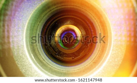 Abstract background. Conceptual design of the photographer's business card.Camera lens in the background for conceptual design. Dark background. Technological concept. Business concept.