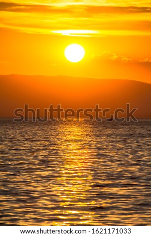 Sunset over Geneva lake in port Valais, Switzerland