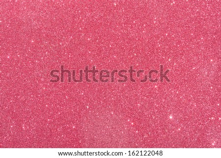 red  background from wrapping paper with glitter