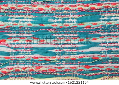 Colorful fabric  texture, background. Closeup fragment