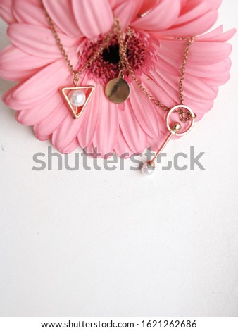 Pink cute gerbera and girly accessories