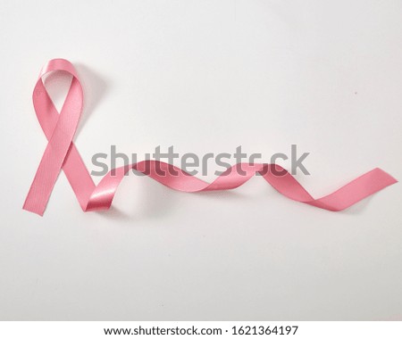 Pink ribbon on white background, Breast Cancer Awareness month, Healthcare, International Women day and World cancer day concept, copy space for text