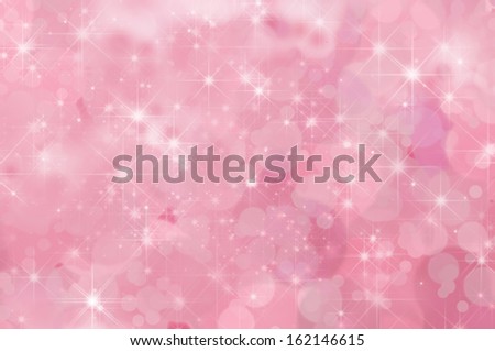 A pink, twinkling star filled abstract background with misty clouds and bokeh.
